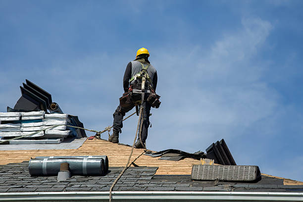 Professional Roofing technician working in North Conway, NH